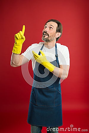 Bearded guy cleaning home. On guard of cleanliness and order. Cleaning service and household duty. Lot of work Stock Photo