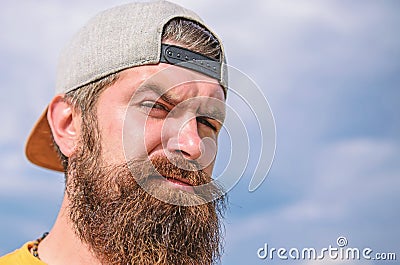 Bearded hipster with stylish mustache. Young and carefree. Bearded hipster wear cap. Springtime concept. Hipster with Stock Photo