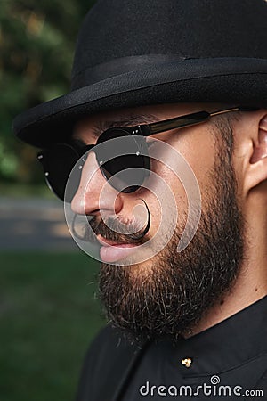 Bearded Man with Bowler Hat Stock Photo