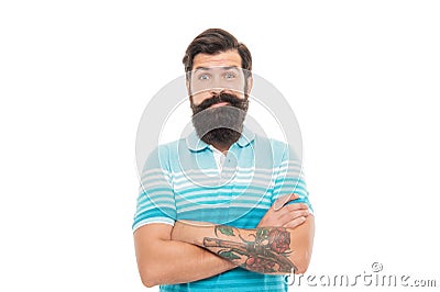 Bearded man in doubt. Doubtful man raising brows. Unshaven man keeping arms crossed Stock Photo