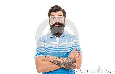 Bearded man in doubt. Doubtful man raising brows. Unshaven man keeping arms crossed Stock Photo