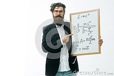 Bearded man with einstein formula and newtons law Stock Photo