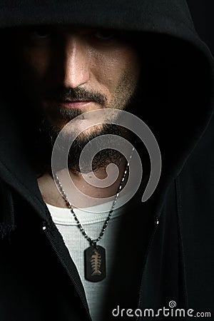 Bearded man hiding his eyes Stock Photo