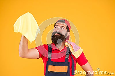 Bearded man hold duster microfiber for cleaning. man clean house. housekeeping business. call for cleaning service. male Stock Photo