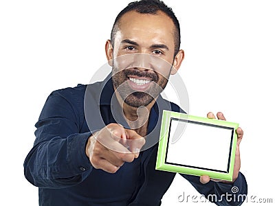 Bearded man holding empty green picture frame Stock Photo