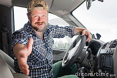 Bearded man sitting in a car cabin Stock Photo