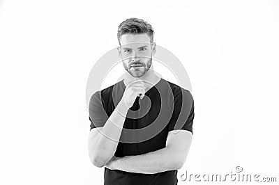 Bearded man touch beard with hand. Man with stylish hair and healthy young skin. Guy with unshaven face and mustache Stock Photo