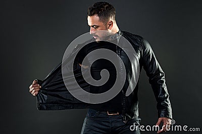 Bearded man undress leather jacket. Man with beard on unshaven face. Fashion model in casual style clothes. Style and Stock Photo