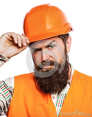 Bearded man worker with beard in building helmet or hard hat. Man builders, industry. Builder in hard hat, foreman or Stock Photo