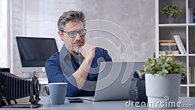 Man working with laptop at home office Stock Photo