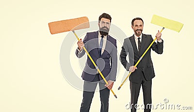 Bearded men formal suits hold mops. Big cleaning day. Cleaning business. Cleaning service concept. Cover our tracks Stock Photo