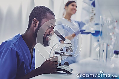 Bearded skillful chemist making new research Stock Photo
