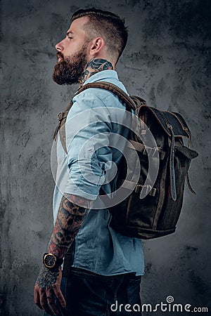 Bearded tattooed man in the studio Stock Photo