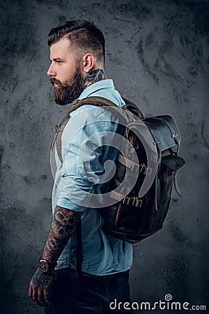 Bearded tattooed man in the studio Stock Photo