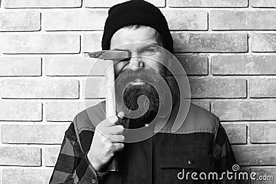 Bearded worker man holding hammer happy face Stock Photo