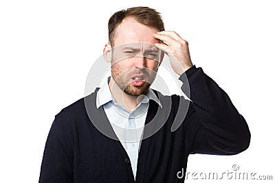 Bearded young man with a throbbing headache Stock Photo