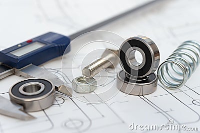 Bearing and caliper and spring and bolt with nut on mechanical engineering drawing Stock Photo