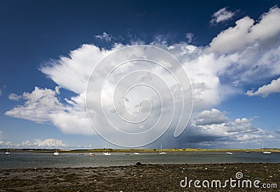 Beatiful deep sky with one oncoming huge cloud. Ireland Stock Photo
