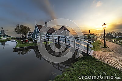 Beaucoutif typical Dutch wooden houses architecture mirrored on Stock Photo