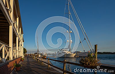 Beaufort waterfront with restaurant and docked yacht. Editorial Stock Photo
