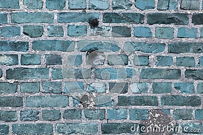 Beauitful old and weathered blue brick walls with cracks fround all over europe Stock Photo