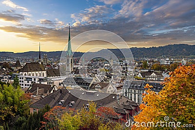 Beauitful sunset over Zurich in autumn with FraumÃ¼nster church Stock Photo