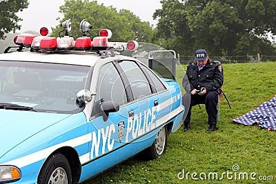 Beaulieu, Hampshire, UK - May 29 2017: Classic NYPD police patrol car and enthusiast driver in uniform Editorial Stock Photo