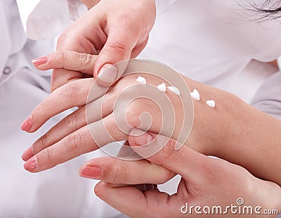 Beautician do massage hand. Stock Photo