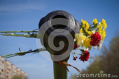 Beautifrul flowers in the barrel of the tank. May 9th. Victory day in Russia. Peace in the world. Memorial day Stock Photo