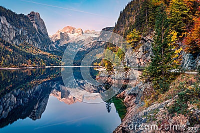 Beautifu autumn view of Gosausee Vorderer lake with Dachstein glacieron background. Amazing sunset scene of Austrian Alps, Upper Stock Photo