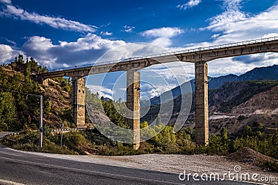 Beautiful abandoned railway bridge on railway from Elbasan to Pogradec, northern Albania. This part of railway is closed and Stock Photo