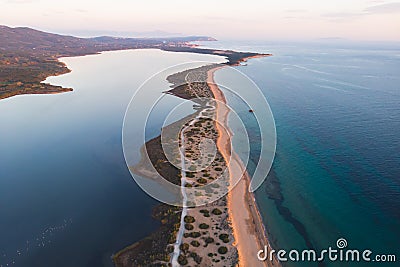 Beautiful aerial vibrant view of Korission Lake Lagoon landscape, Corfu island, Greece with pink flamingos flock, Ionian sea beach Stock Photo