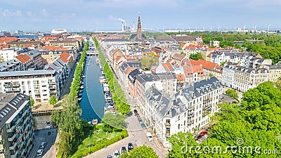 Beautiful aerial view of Copenhagen skyline from above, Nyhavn historical pier port and canal with color buildings and boats Stock Photo