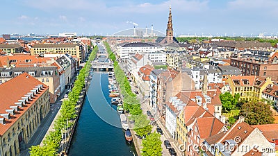 Beautiful aerial view of Copenhagen skyline from above, Nyhavn historical pier port and canal with color buildings and boats Stock Photo