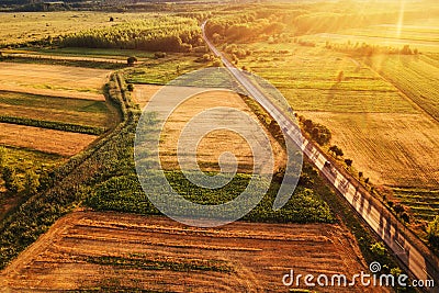 Beautiful aerial view of countryside and fields in sunset Stock Photo