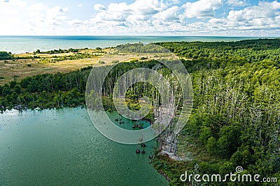 Beautiful aerial view of lake Plaze in Klaipeda district, where bird lovers can watch the lake`s water birds up close Stock Photo