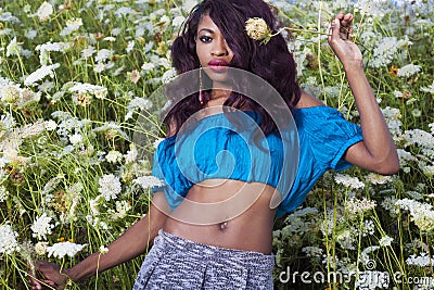 Beautiful African American girl enjoys summer day. Stock Photo