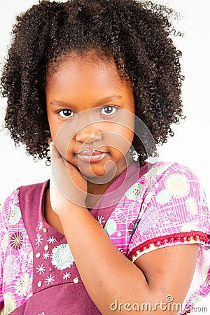 Beautiful african american girl with the hand resting on the cheek l Stock Photo