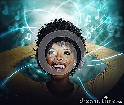 Beautiful African American Young woman listening to online streaming music Stock Photo