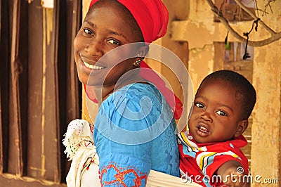 Beautiful african woman with baby Editorial Stock Photo