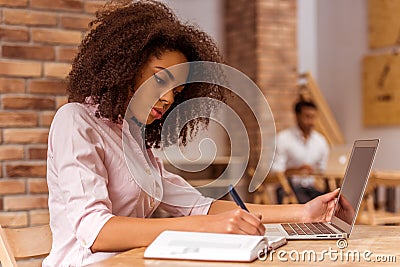 Beautiful Afro-American woman working Stock Photo