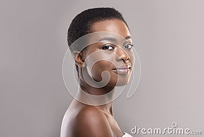 Beautiful afro woman with natural makeup and short hair Stock Photo