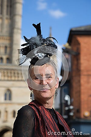 Beautiful aged woman dressed as a Steampunk character captured during the Lincoln city parade Editorial Stock Photo