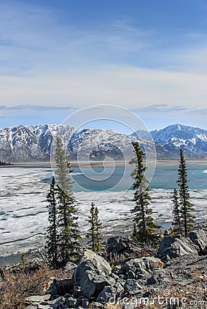 Beautiful Alaskan Landscape of a lake thawing in Springtime in the Wrangell Mountains Stock Photo