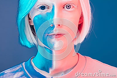 Beautiful alien with pale skin and blue face Stock Photo