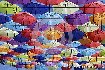 Beautiful alley of multi-colored umbrellas. Editorial Stock Photo