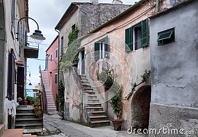 Beautiful alley through vintage houses in Capoliveri, Italy Editorial Stock Photo