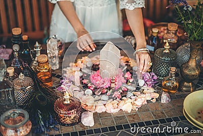 Beautiful altar with crystals and rose flowers Stock Photo