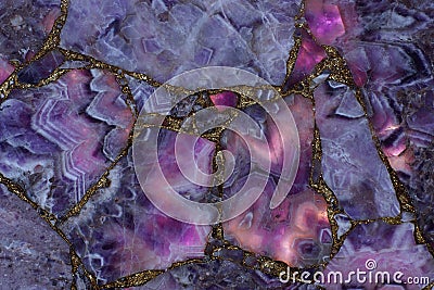 Beautiful amethyst purple backlit, the light highlights the stone and it turns pink Stock Photo