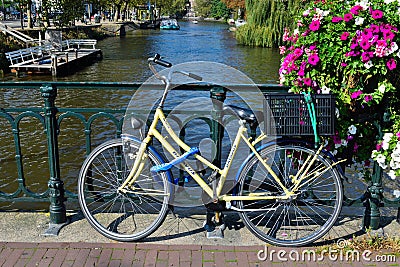 Beautiful amsterdam bicycle on bridge Editorial Stock Photo